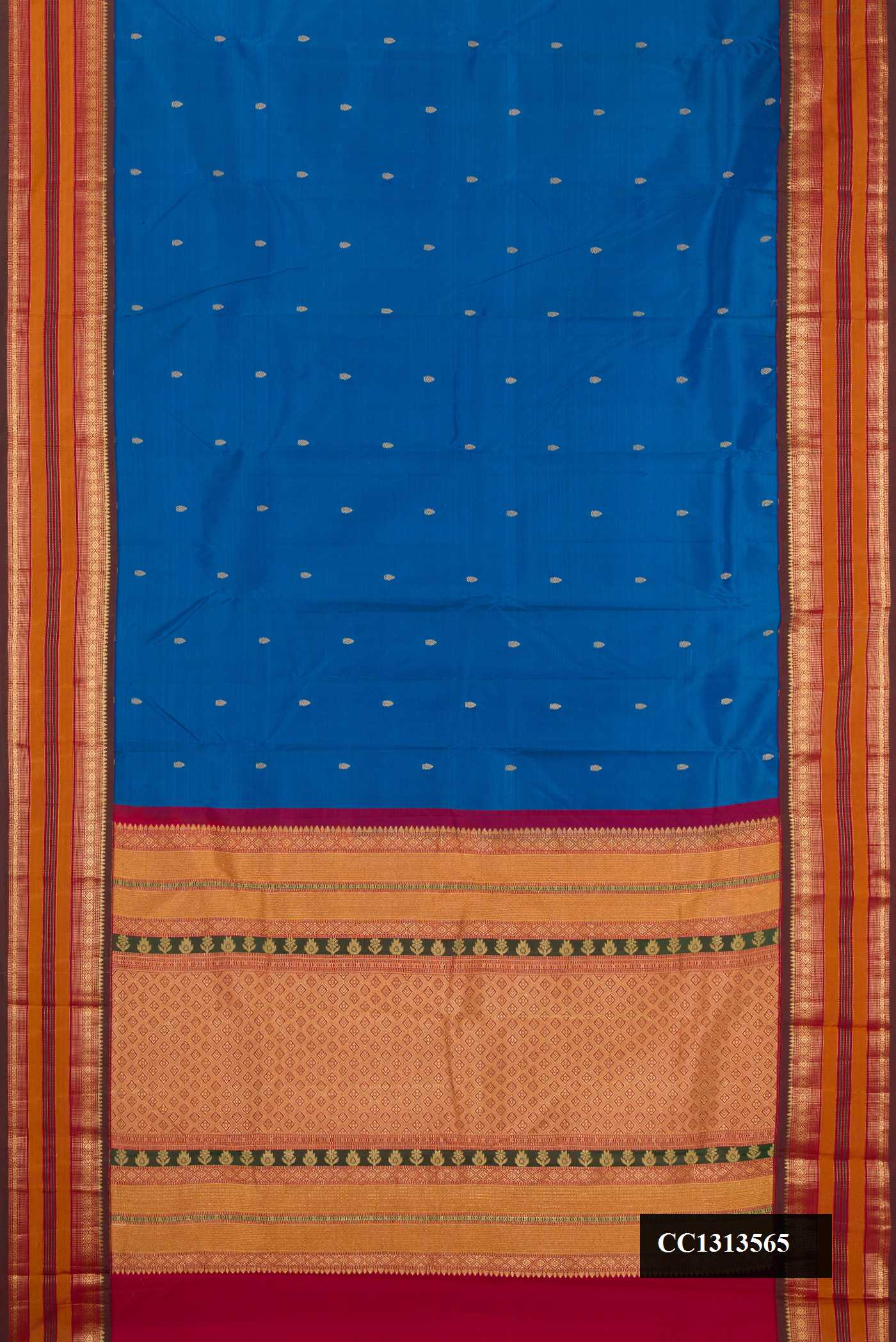 Royal Blue Dual Tone Kanchipuram Silk Saree with Zari Butta on the body and Fancy Border.  displayed on a mannequin