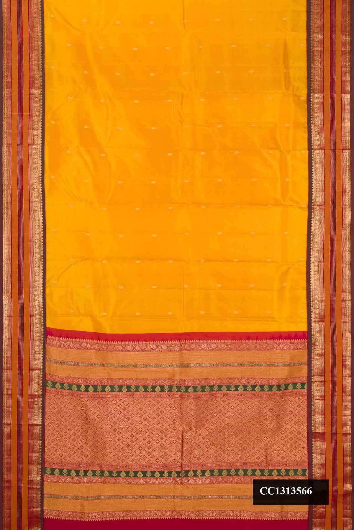 Yellow Dual Tone Kanchipuram Silk Saree with Zari Butta on the body and Fancy Border.  displayed on a mannequin