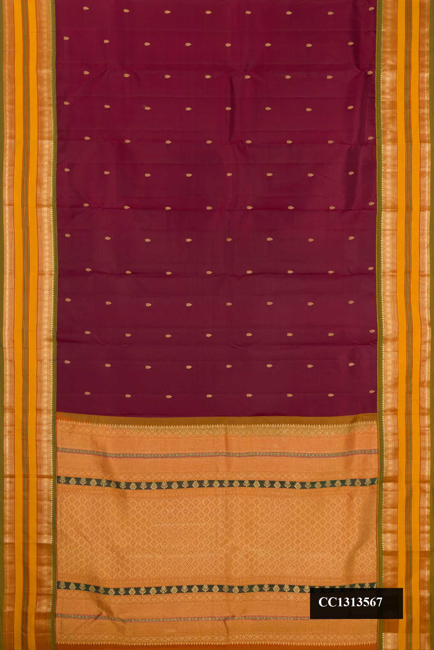 Brown Dual Tone Kanchipuram Silk Saree with Zari Butta on the body and Fancy Border.  displayed on a mannequin