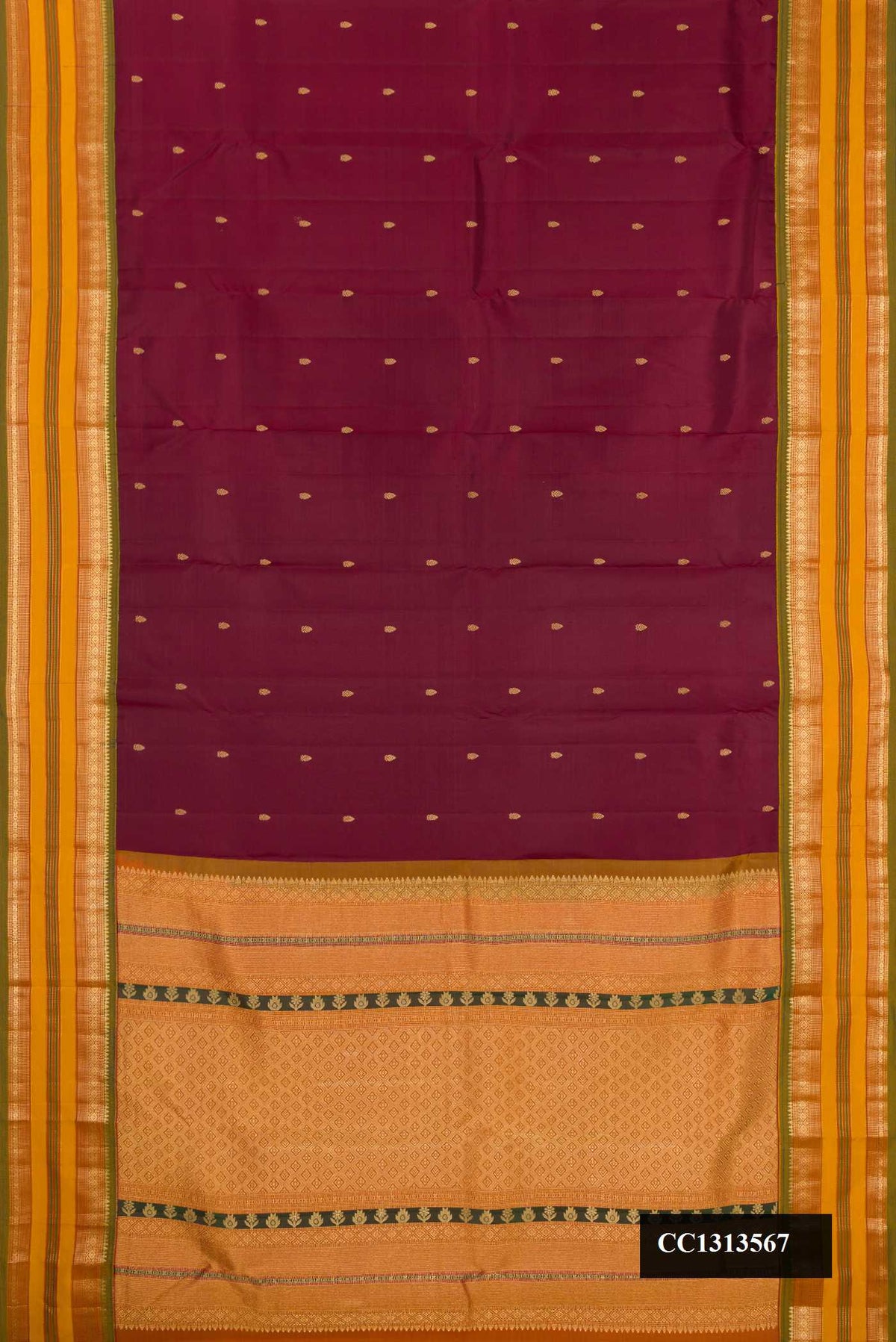 Brown Dual Tone Kanchipuram Silk Saree with Zari Butta on the body and Fancy Border.  displayed on a mannequin