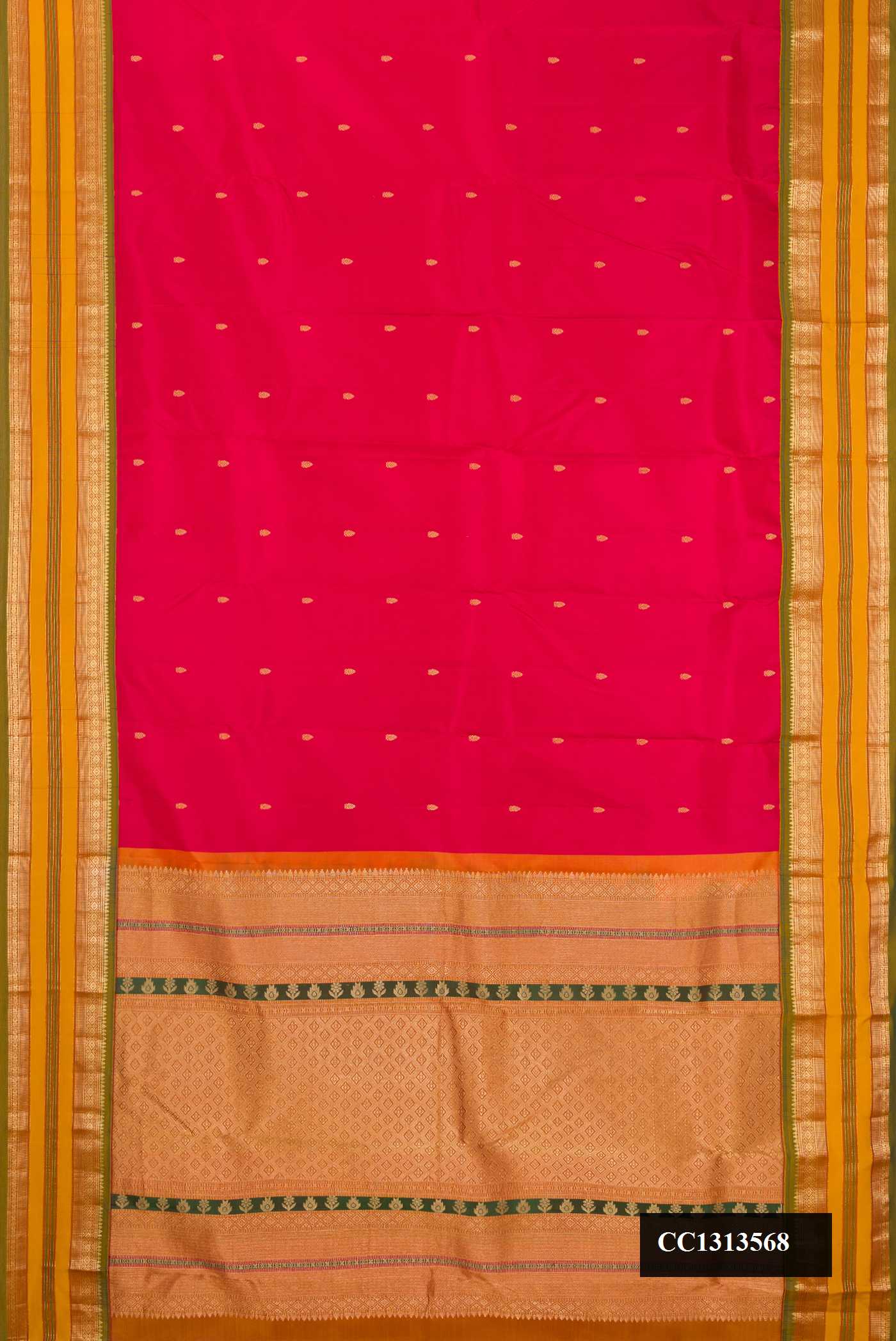 Maroon Dual Tone Kanchipuram Silk Saree with Zari Butta on the body and Fancy Border.  displayed on a mannequin