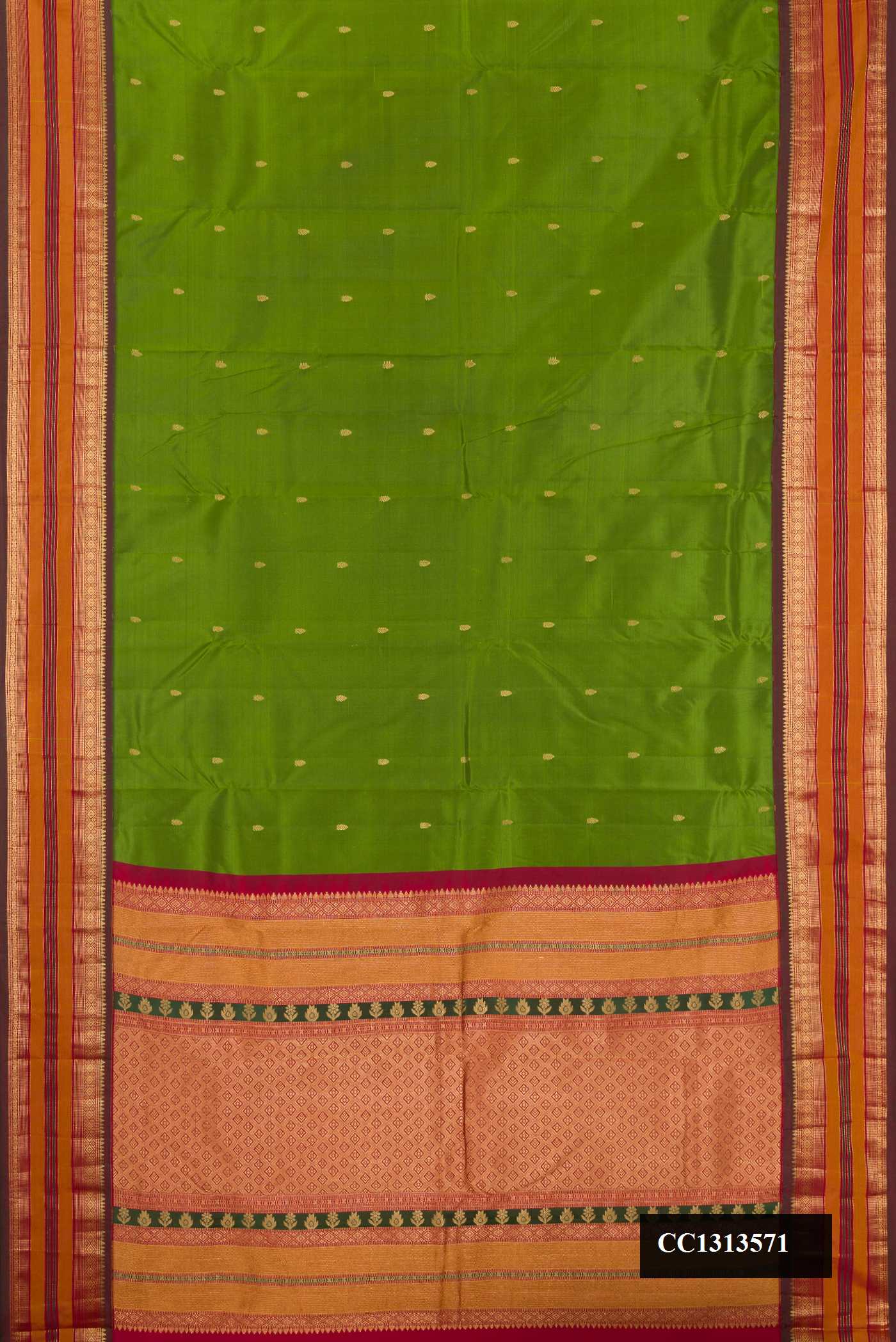Parrot Green Dual Tone Kanchipuram Silk Saree with Zari Butta on the body and Fancy Border.  displayed on a mannequin