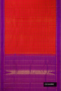 Orange Dual Tone Kanchipuram Silk Saree with Checked design on the body and Zari Border.  displayed on a mannequin