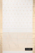 White Dual Tone Kanchipuram Silk Saree with Zari Butta on the body and Zari Border.  displayed on a mannequin