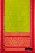 Parrot Green Dual Tone Kanchipuram Silk Saree with Zari Butta on the body and Zari Border.  displayed on a mannequin