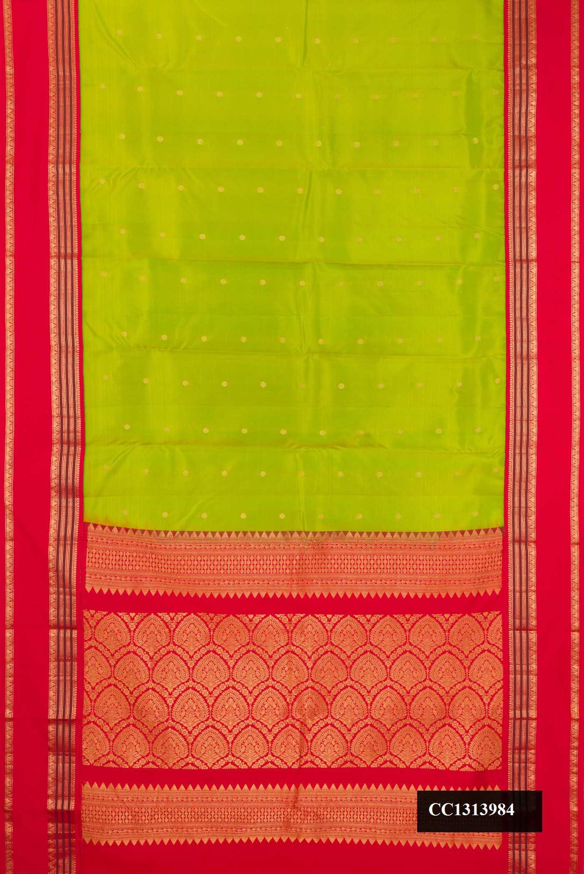 Parrot Green Dual Tone Kanchipuram Silk Saree with Zari Butta on the body and Zari Border.  displayed on a mannequin