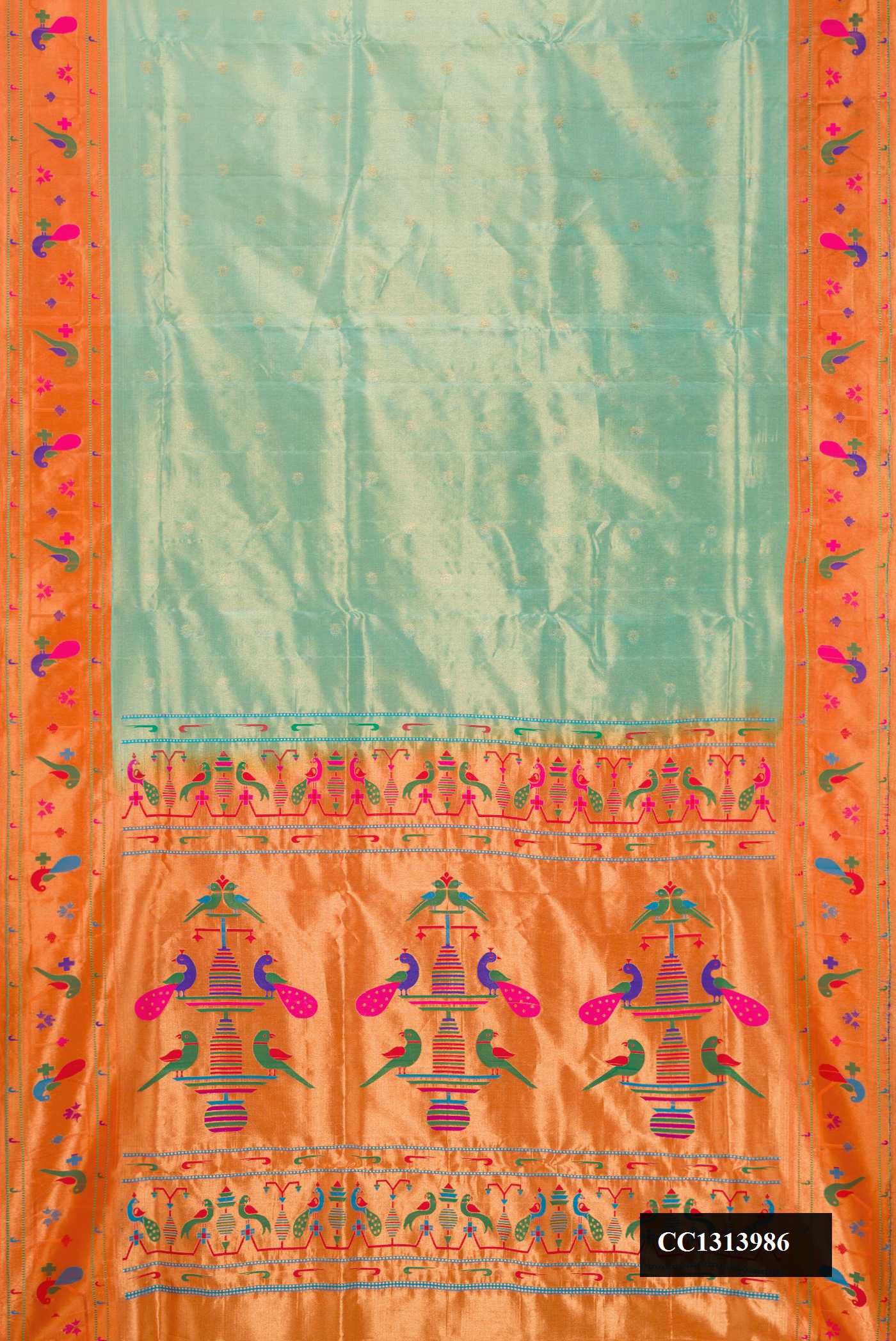 Pista Green Dual Tone Paithani Silk Saree with Zari Butta on the body and Paithani Border.  displayed on a mannequin