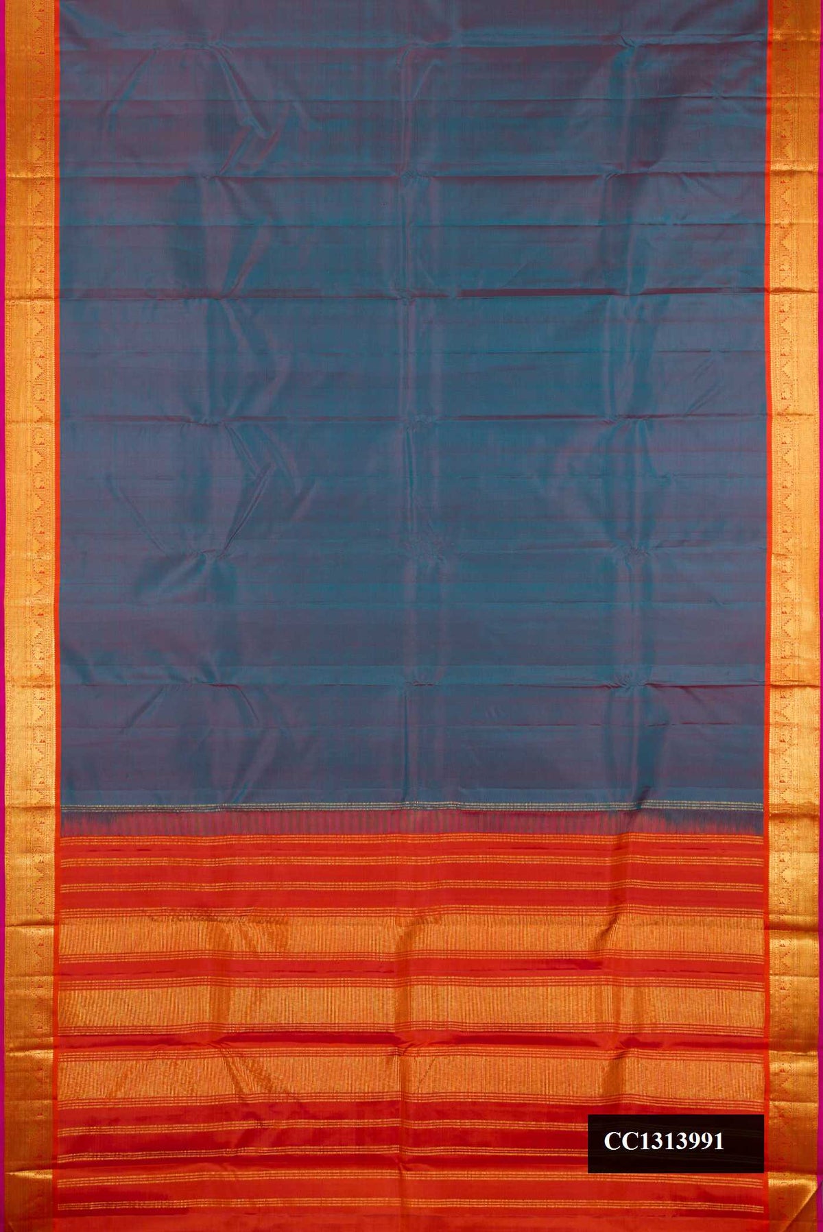 Peacock Blue Dual Tone Kanchipuram Silk Saree with Plain Body and Zari Border.  displayed on a mannequin