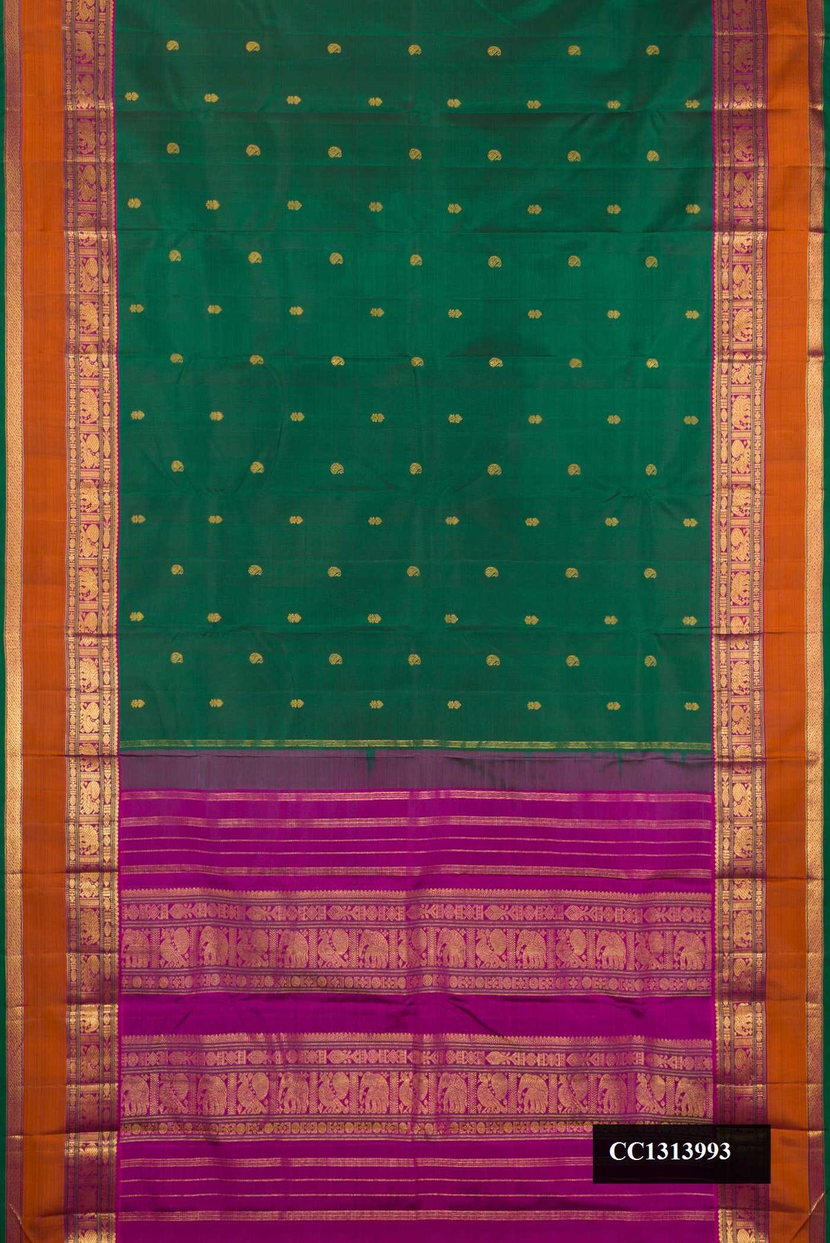 Bottle Green Dual Tone Kanchipuram Silk Saree with Zari Butta on the body and Fancy Border.  displayed on a mannequin