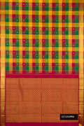 Multi Dual Tone Kanchipuram Silk Saree with Checked design on the body and Zari Border.  displayed on a mannequin