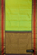 Parrot Green Dual Tone Kanchipuram Silk Saree with Stripes on the body and Zari Border.  displayed on a mannequin