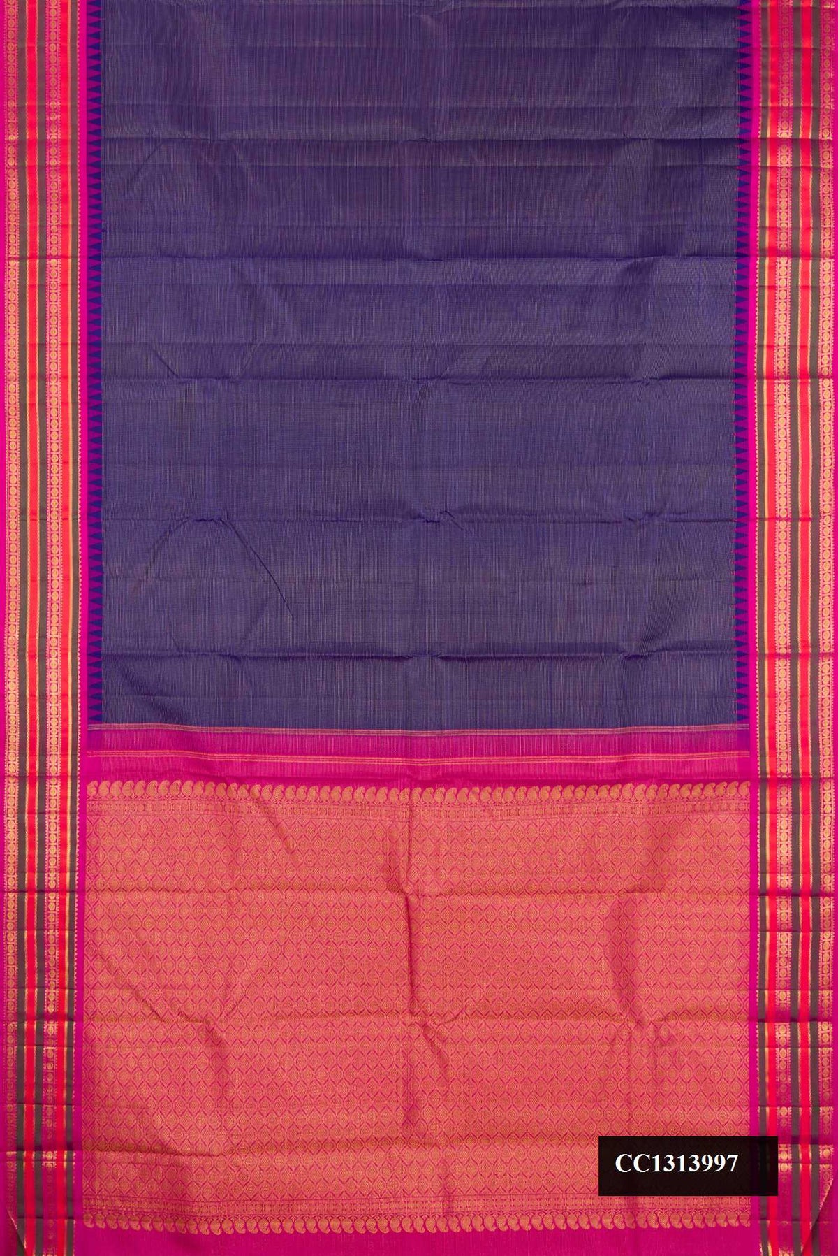 Navy Blue Dual Tone Kanchipuram Silk Saree with Stripes on the body and Fancy Border.  displayed on a mannequin