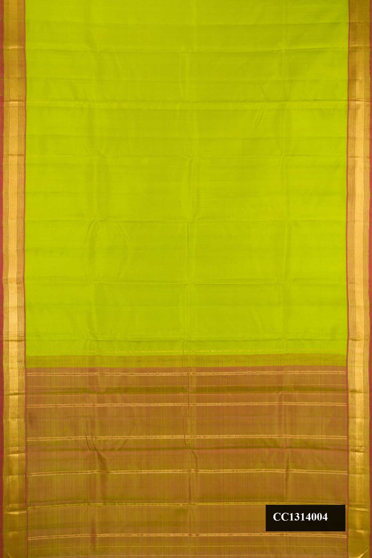 Parrot Green Dual Tone Kanchipuram Silk Saree with Plain Body and Zari Border.  displayed on a mannequin