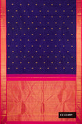 Navy Blue Dual Tone Kanchipuram Silk Saree with Zari Butta on the body and Zari Border.  displayed on a mannequin