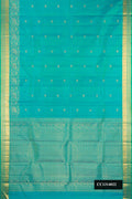 Sea Green Dual Tone Kanchipuram Silk Saree with Zari Butta on the body and Fancy Border.  displayed on a mannequin