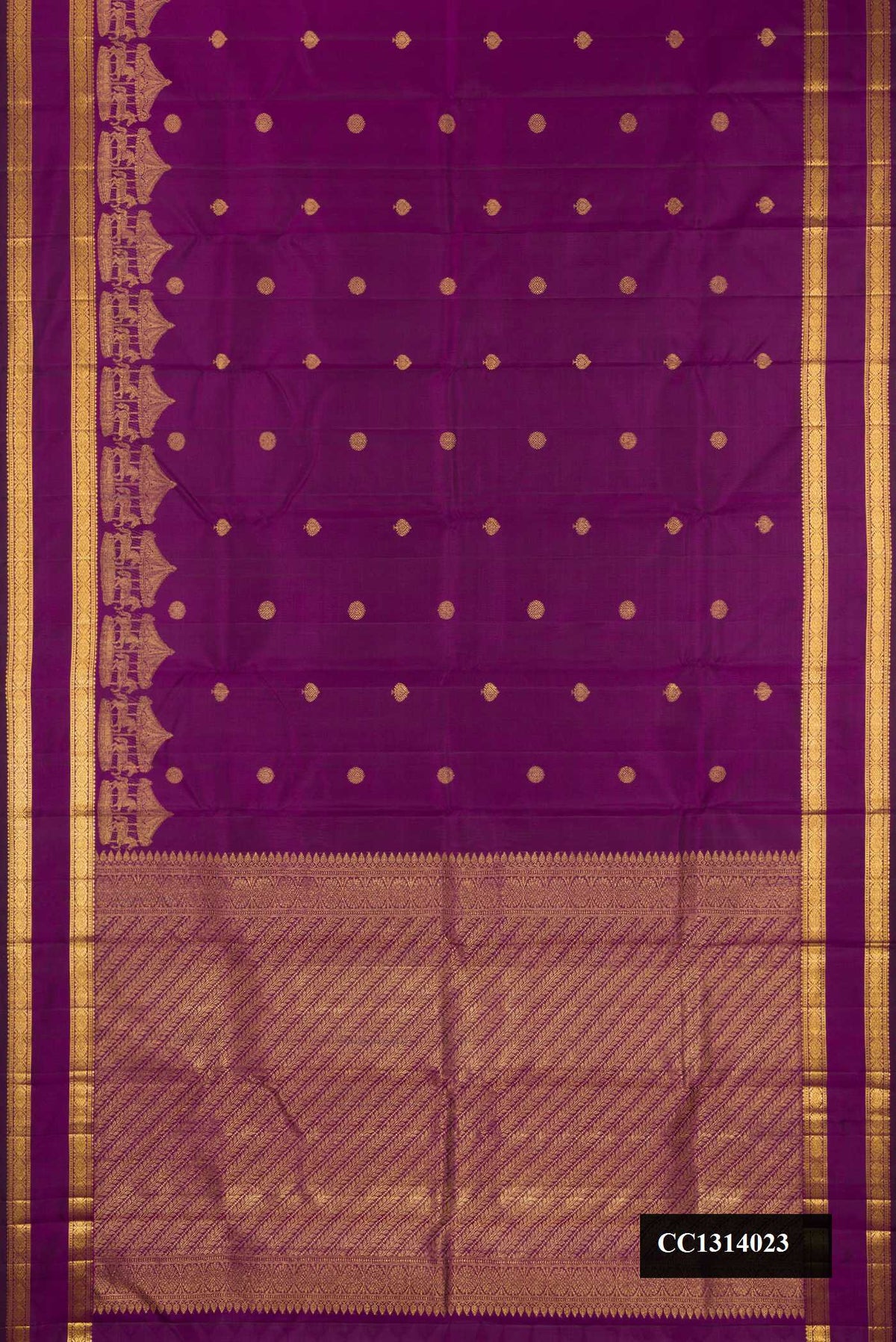 Purple Dual Tone Kanchipuram Silk Saree with Zari Butta on the body and Fancy Border.  displayed on a mannequin