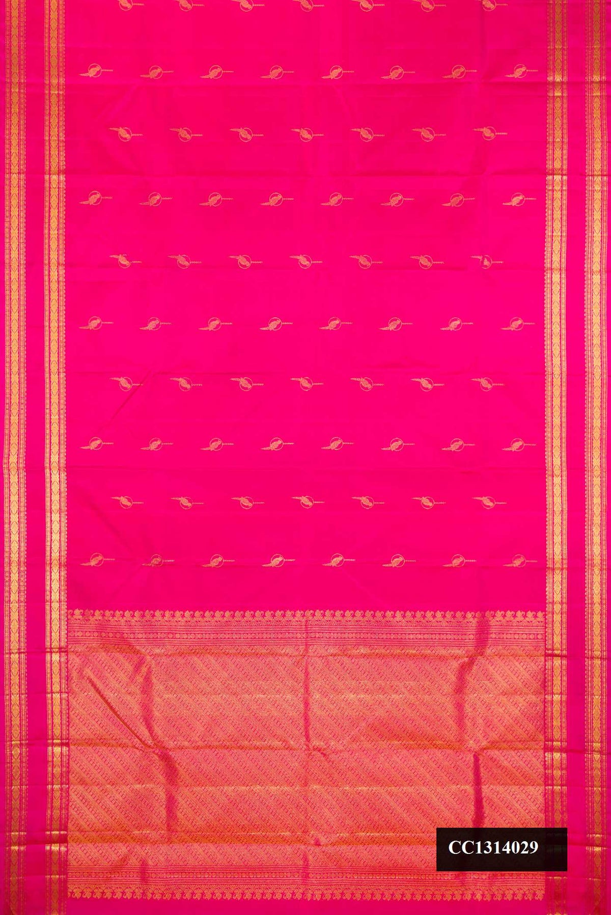 Dark Pink Dual Tone Kanchipuram Silk Saree with Zari Butta on the body and Fancy Border.  displayed on a mannequin