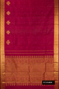 Maroon Dual Tone Kanchipuram Silk Saree with Thread Butta on the body and Zari Border.  displayed on a mannequin