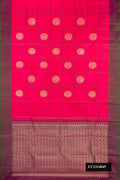 Coral Dual Tone Kanchipuram Silk Saree with Checked design on the body and Plain Border.  displayed on a mannequin