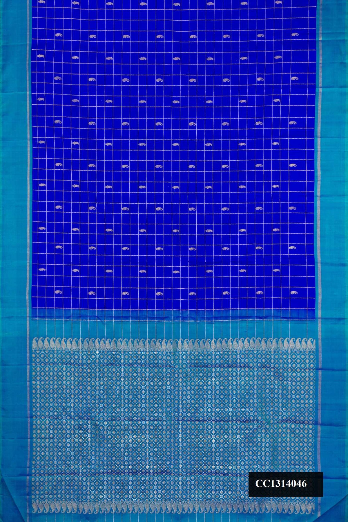 Royal Blue Dual Tone Kanchipuram Silk Saree with Checked design on the body and Zari Border.  displayed on a mannequin