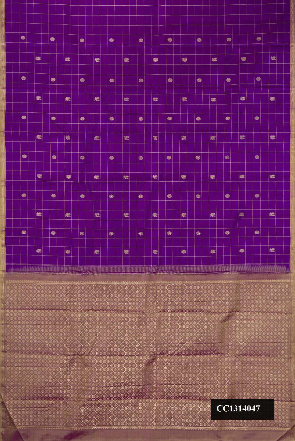 Purple Dual Tone Kanchipuram Silk Saree with Checked design on the body and Zari Border.  displayed on a mannequin