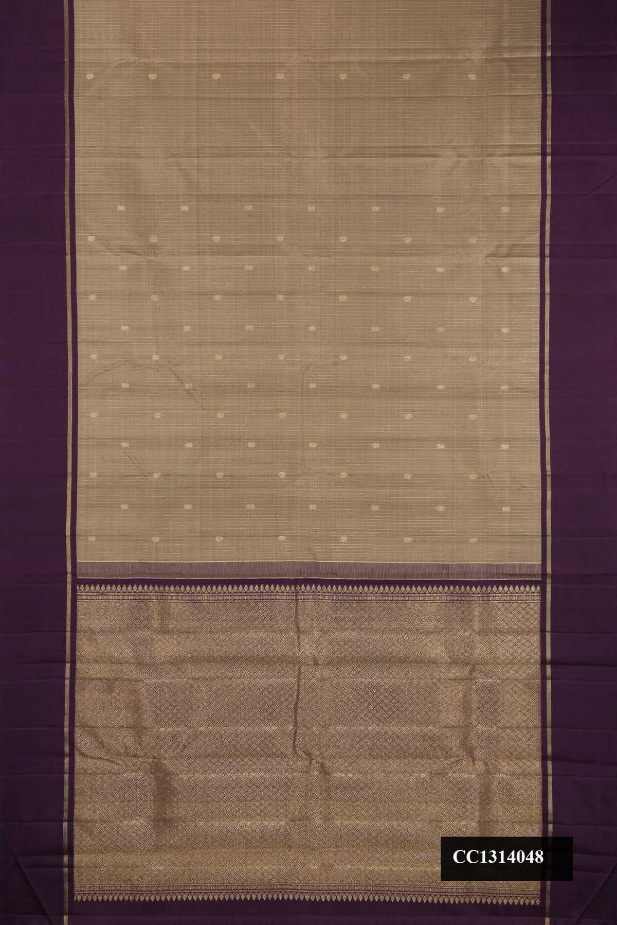 Grey Dual Tone Kanchipuram Silk Saree with Checked design on the body and Zari Border.  displayed on a mannequin