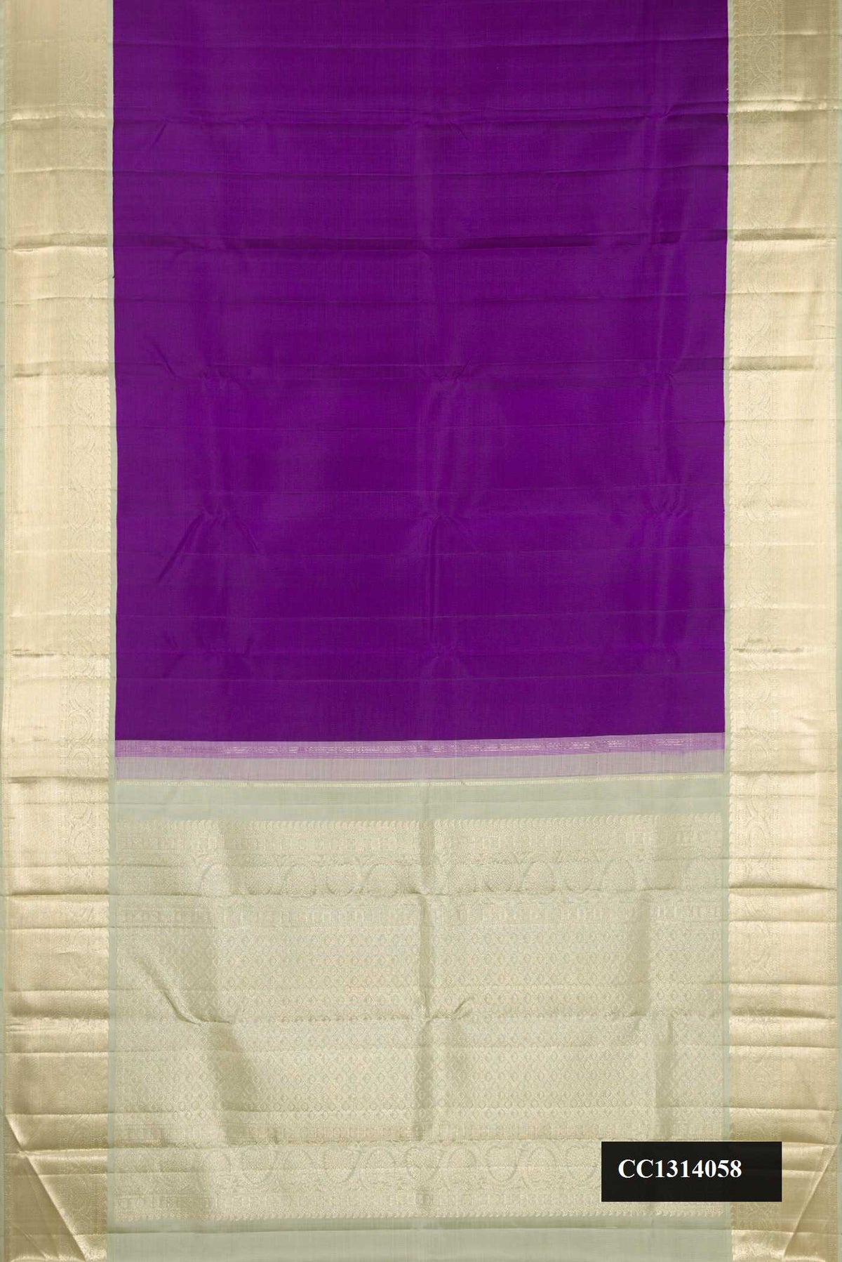 Violet Dual Tone Kanchipuram Silk Saree with Plain Body and Zari Border.  displayed on a mannequin