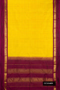 Lemon Yellow Dual Tone Kanchipuram Silk Saree with Checked design on the body and Zari Border.  displayed on a mannequin