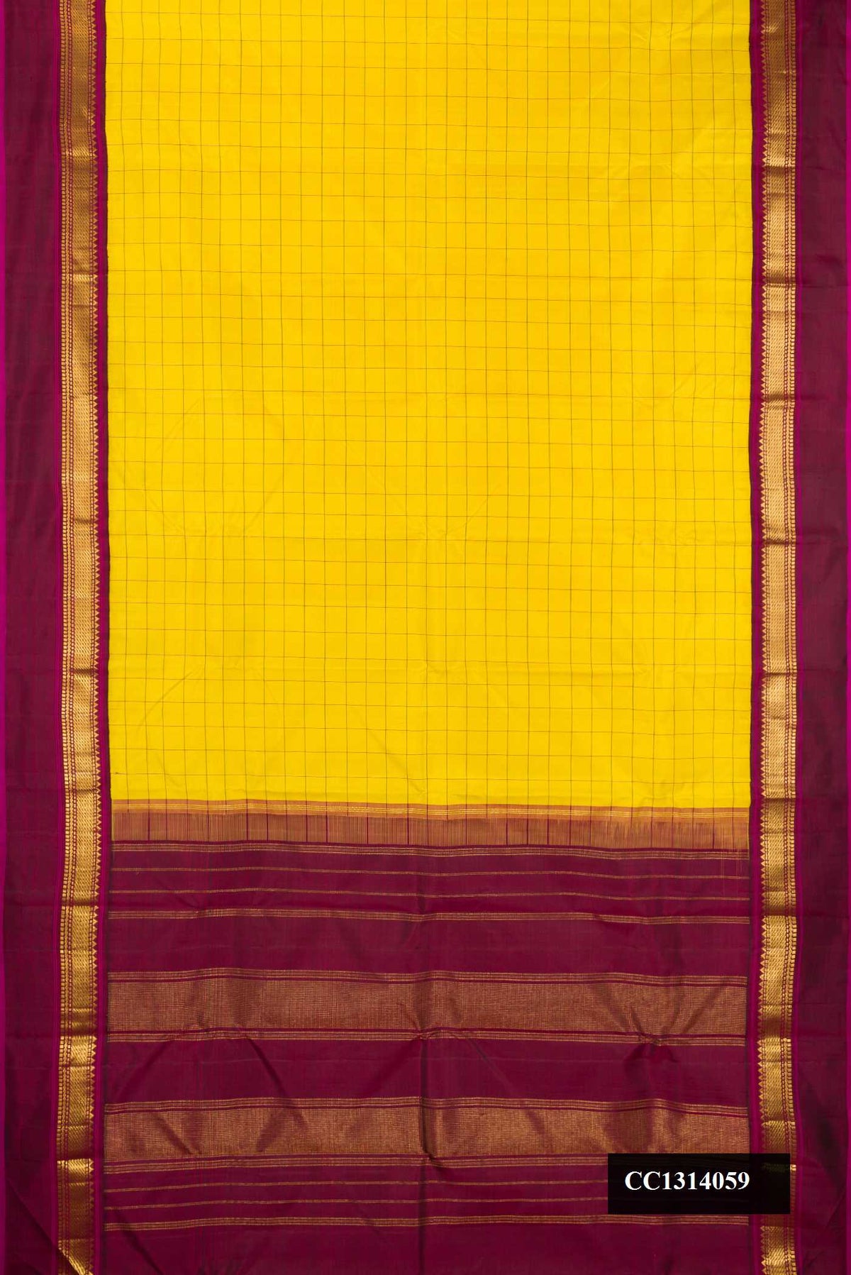 Lemon Yellow Dual Tone Kanchipuram Silk Saree with Checked design on the body and Zari Border.  displayed on a mannequin