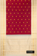 Maroon Dual Tone Kanchipuram Silk Saree with Zari Butta on the body and Fancy Border.  displayed on a mannequin