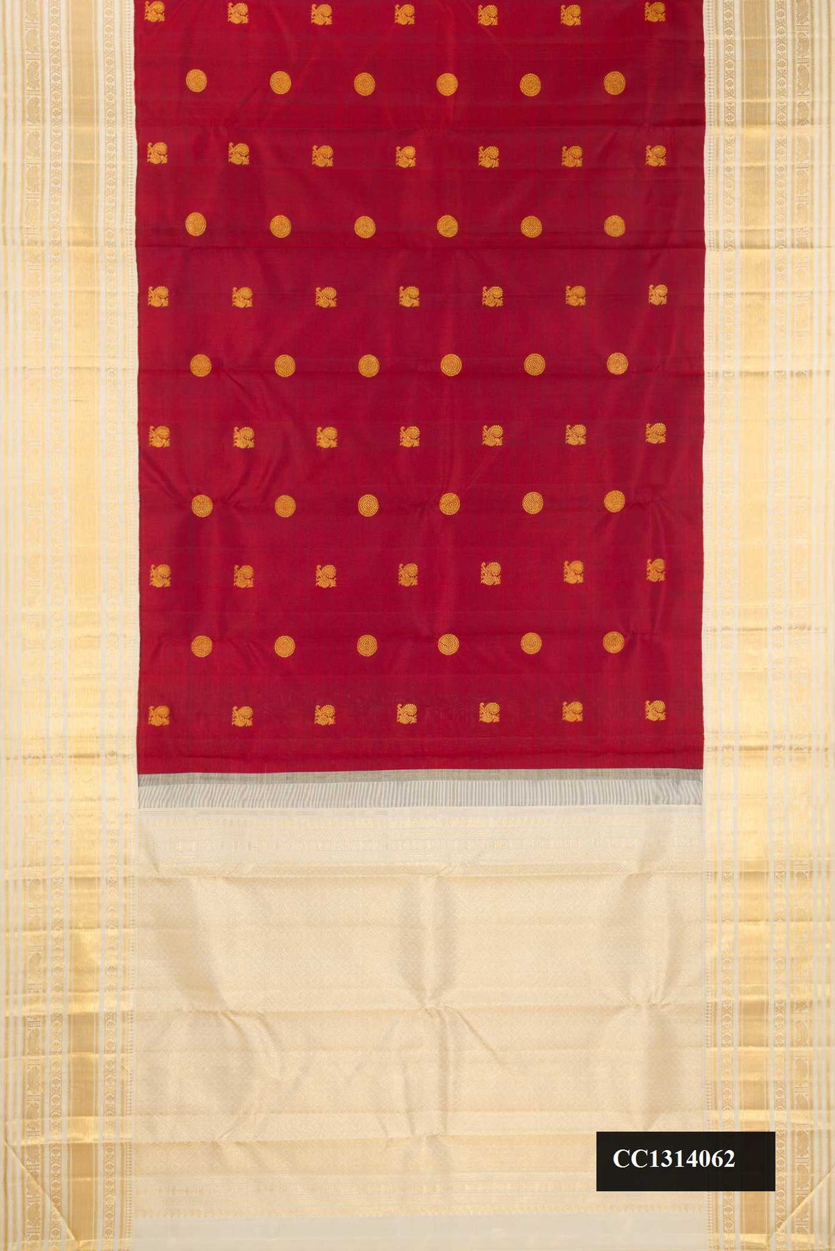 Maroon Dual Tone Kanchipuram Silk Saree with Zari Butta on the body and Fancy Border.  displayed on a mannequin