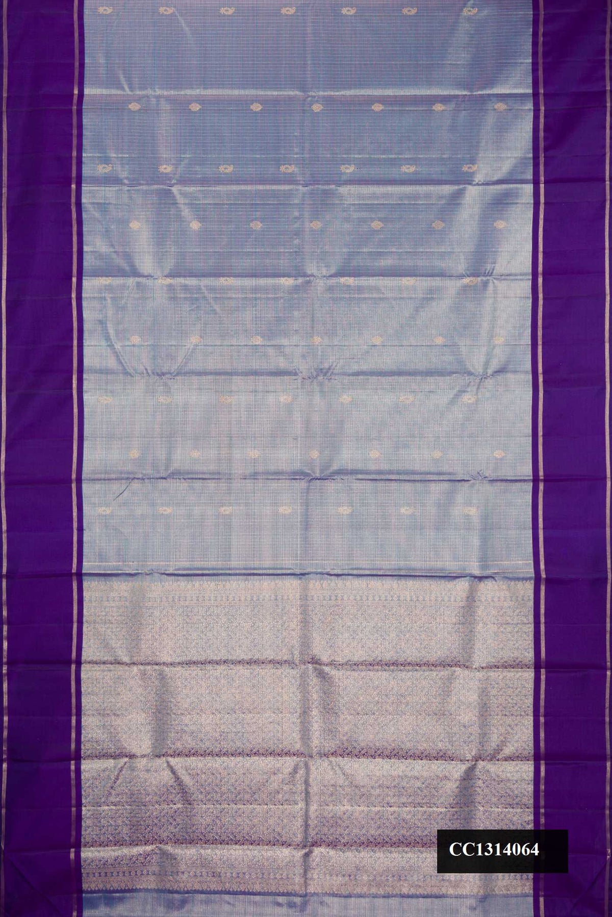 Light Blue Dual Tone Kanchipuram Silk Saree with Checked design on the body and Zari Border.  displayed on a mannequin