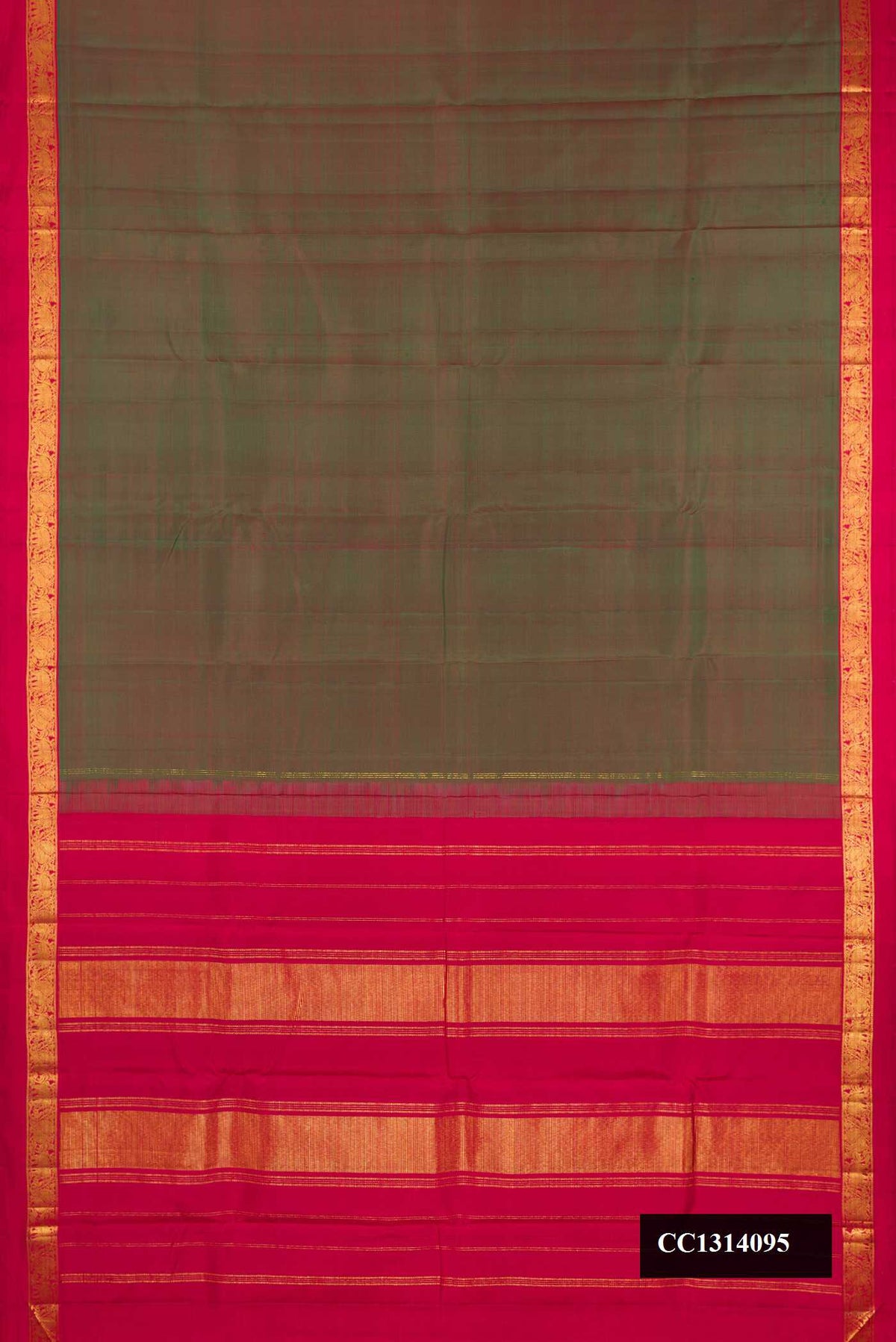 Bottle Green Dual Tone Kanchipuram Silk Saree with Plain Body and Zari Border.  displayed on a mannequin