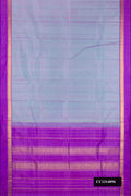 Light Blue Dual Tone Kanchipuram Silk Saree with Plain Body and Zari Border.  displayed on a mannequin