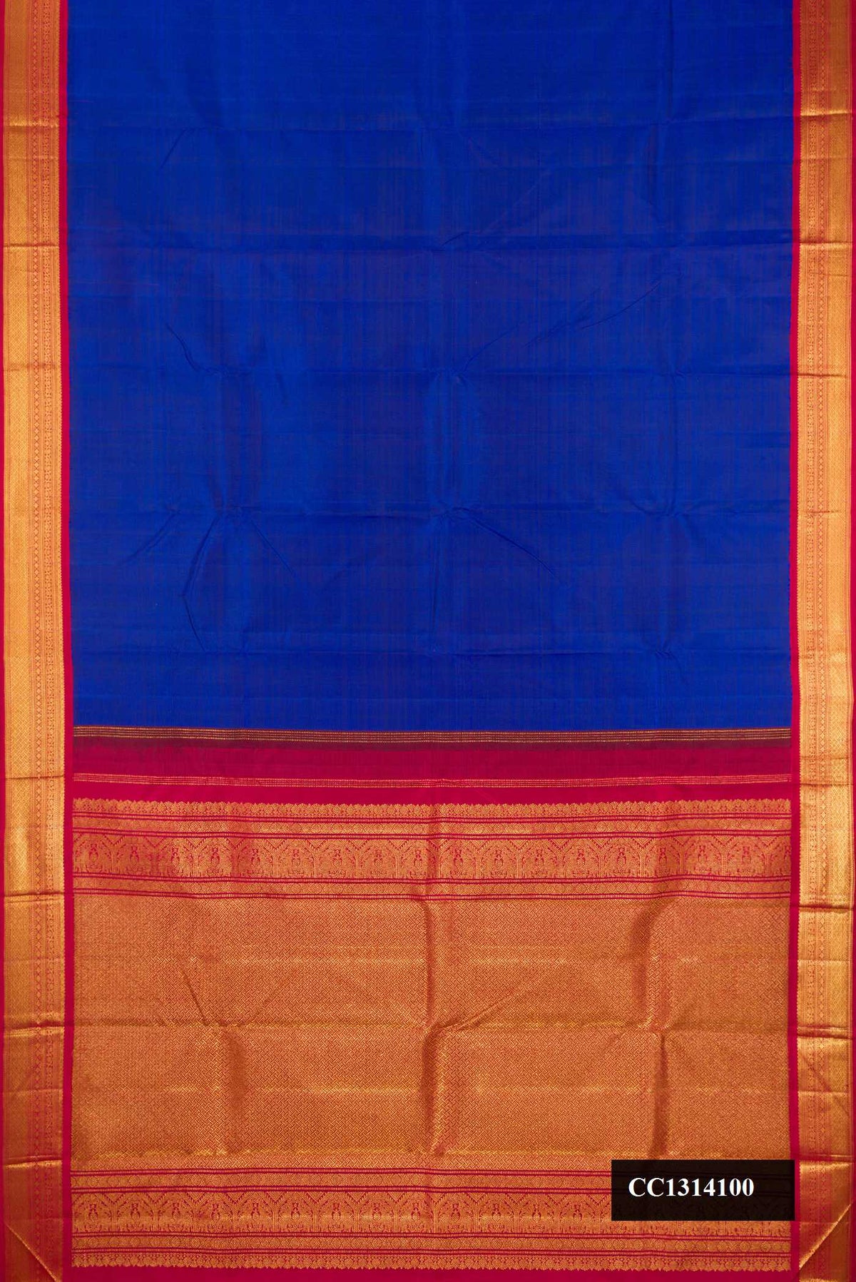 Royal Blue Dual Tone Kanchipuram Silk Saree with Plain Body and Zari Border.  displayed on a mannequin