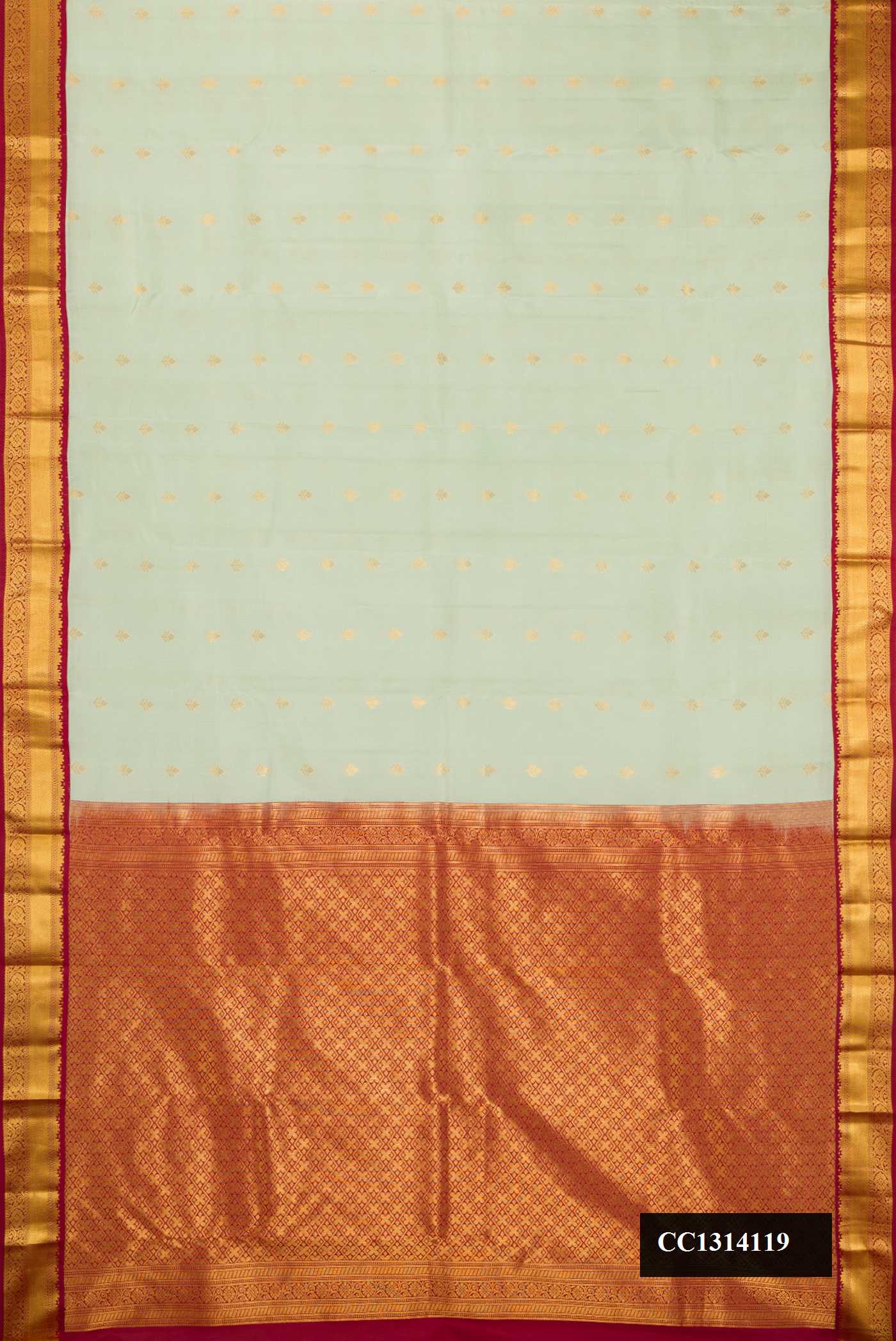 Pista Green Dual Tone Kanchipuram Silk Saree with Zari Butta on the body and Zari Border.  displayed on a mannequin