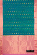 Peacock Blue Dual Tone Kanchipuram Silk Saree with Zari Butta on the body and Zari Border.  displayed on a mannequin