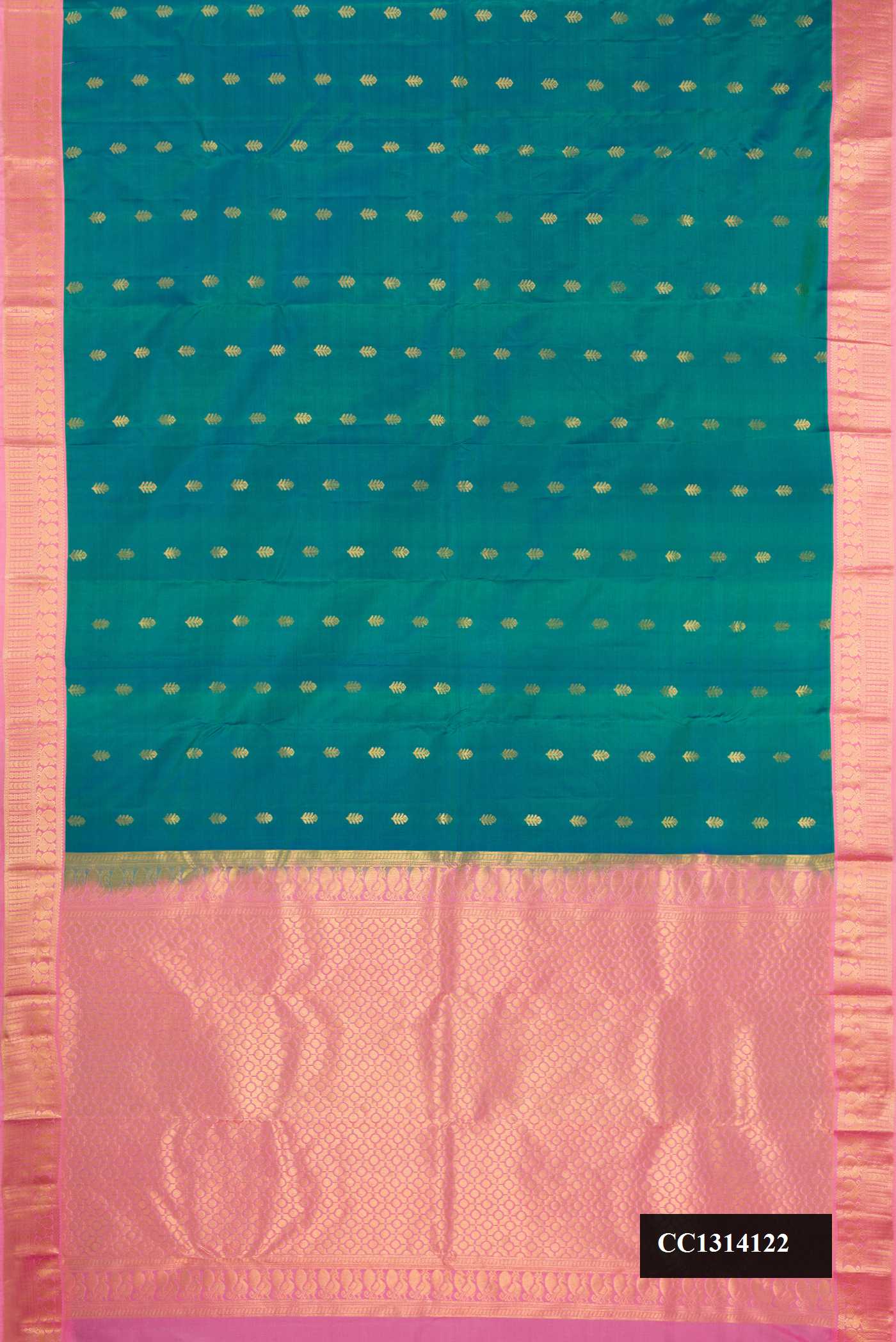 Peacock Blue Dual Tone Kanchipuram Silk Saree with Zari Butta on the body and Zari Border.  displayed on a mannequin