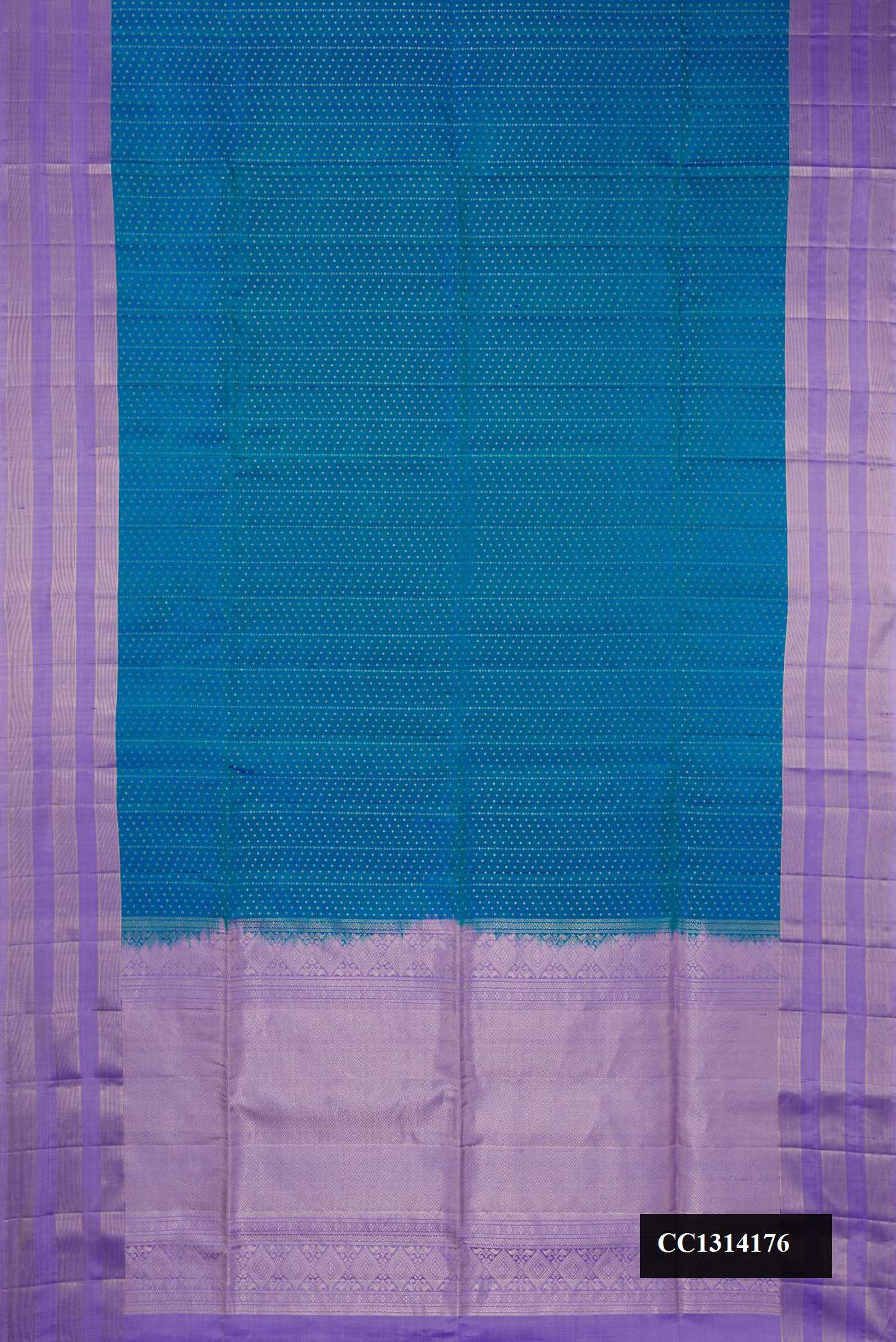 Peacock Blue Dual Tone Soft Silk Saree with Zari Butta on the body and Fancy Border.  displayed on a mannequin