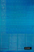 Peacock Blue Dual Tone Soft Silk Saree with Zari Butta on the body and Fancy Border.  displayed on a mannequin
