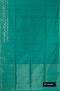 Green Dual Tone Soft Silk Saree with Zari Butta on the body and Fancy Border.  displayed on a mannequin