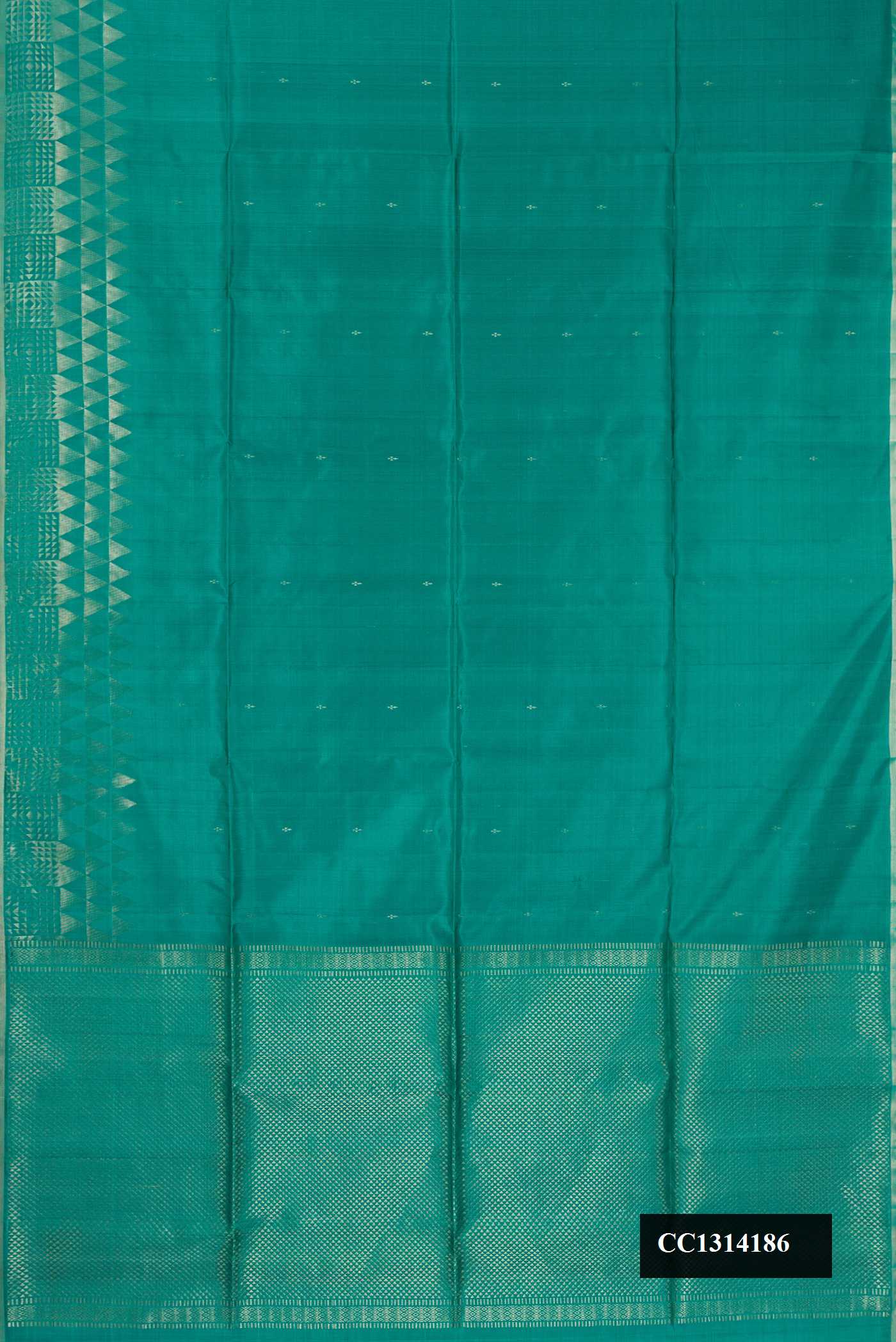 Green Dual Tone Soft Silk Saree with Zari Butta on the body and Fancy Border.  displayed on a mannequin