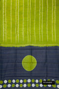 Parrot Green Dual Tone Tussar Silk Saree with Stripes on the body and Embroidered Border.  displayed on a mannequin