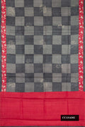 Grey Dual Tone Tussar Silk Saree with Checked design on the body and Printed Border.  displayed on a mannequin