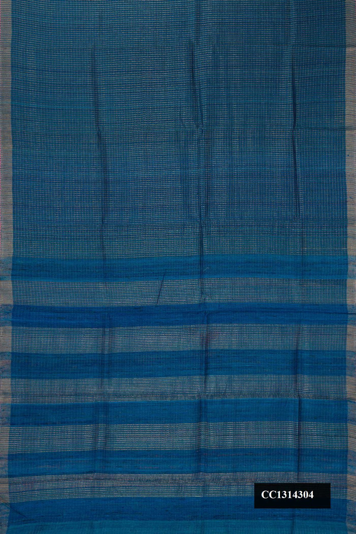 Peacock Blue Dual Tone Tussar Silk Saree with Stripes on the body and Zari Border.  displayed on a mannequin