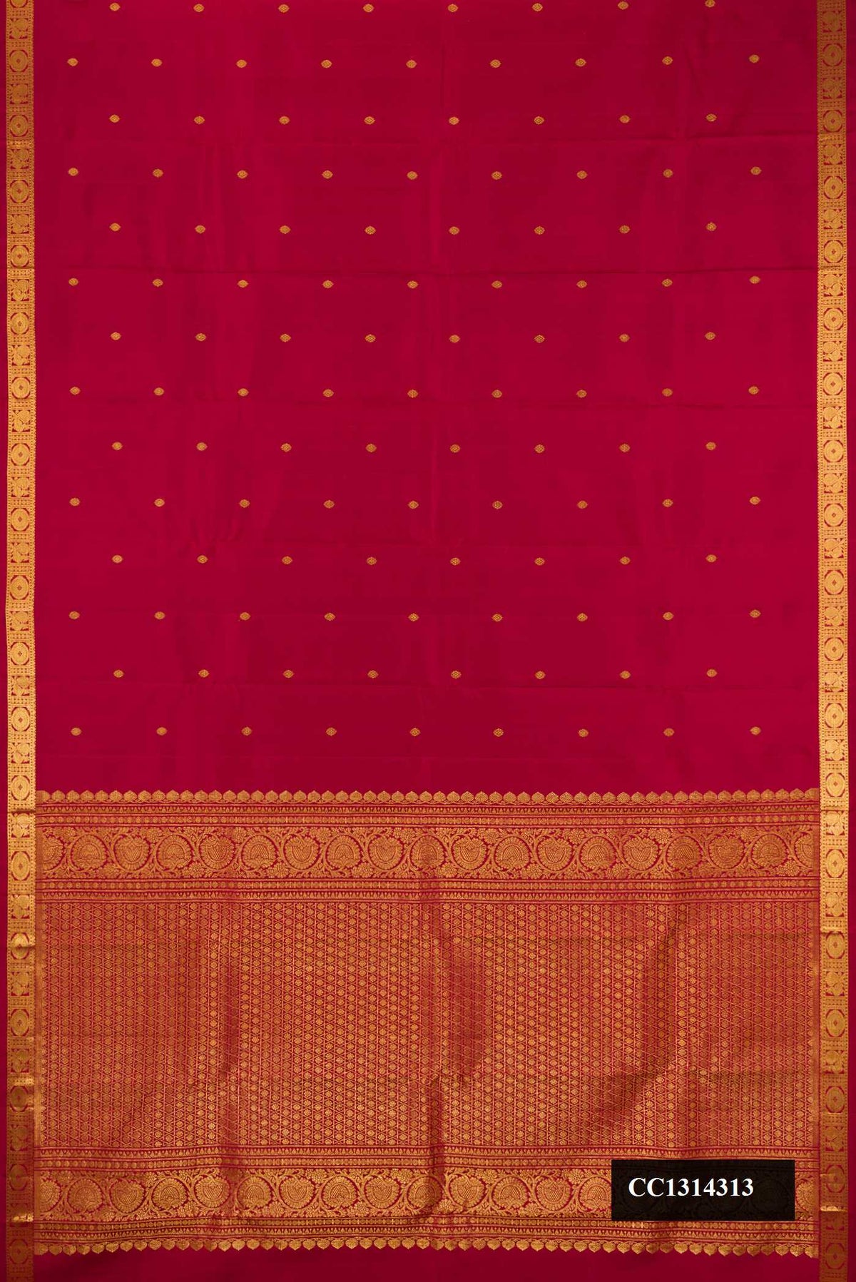 Maroon Dual Tone Kanchipuram Silk Saree with Zari Butta on the body and Zari Border.  displayed on a mannequin