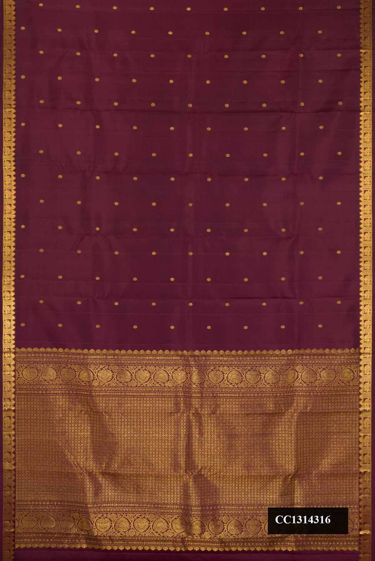 Coffee Brown Dual Tone Kanchipuram Silk Saree with Zari Butta on the body and Zari Border.  displayed on a mannequin