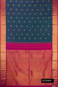 Peacock Blue Dual Tone Kanchipuram Silk Saree with Zari Butta on the body and Zari Border.  displayed on a mannequin