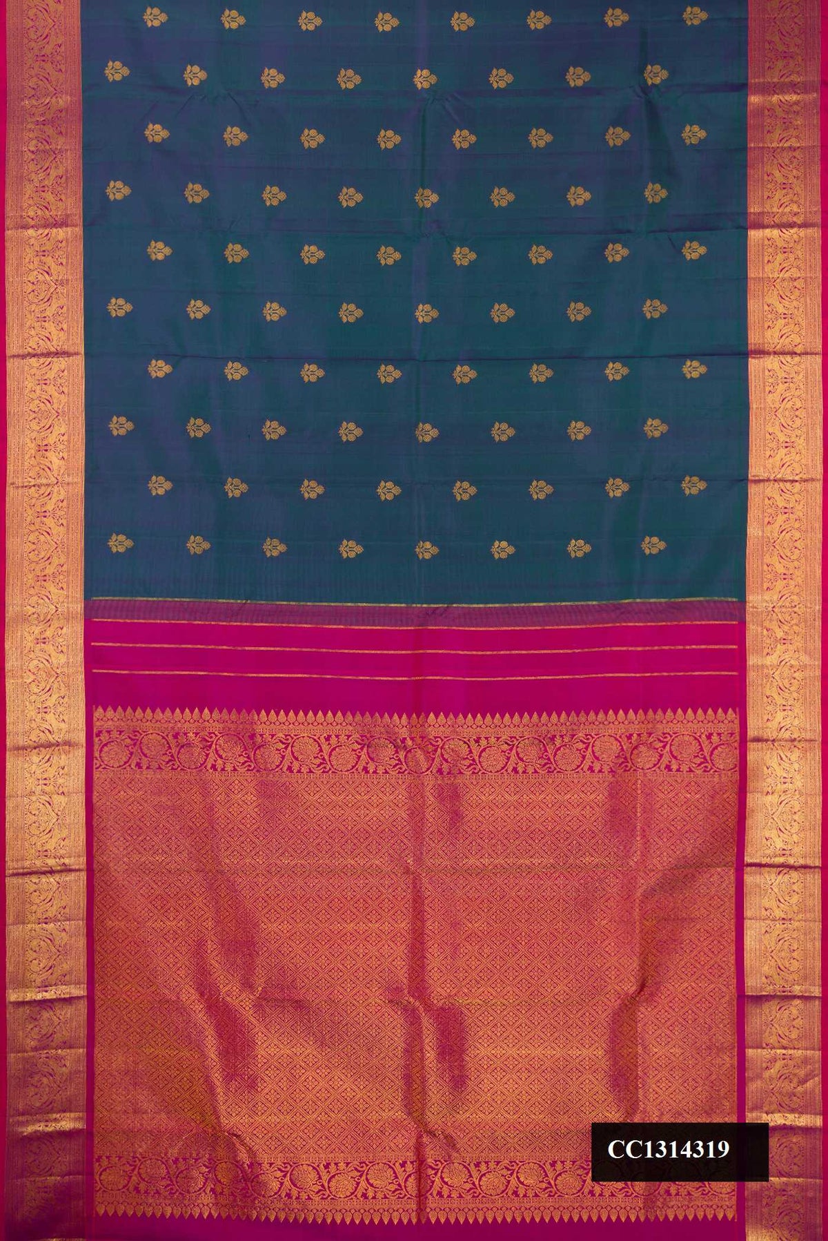 Peacock Blue Dual Tone Kanchipuram Silk Saree with Zari Butta on the body and Zari Border.  displayed on a mannequin
