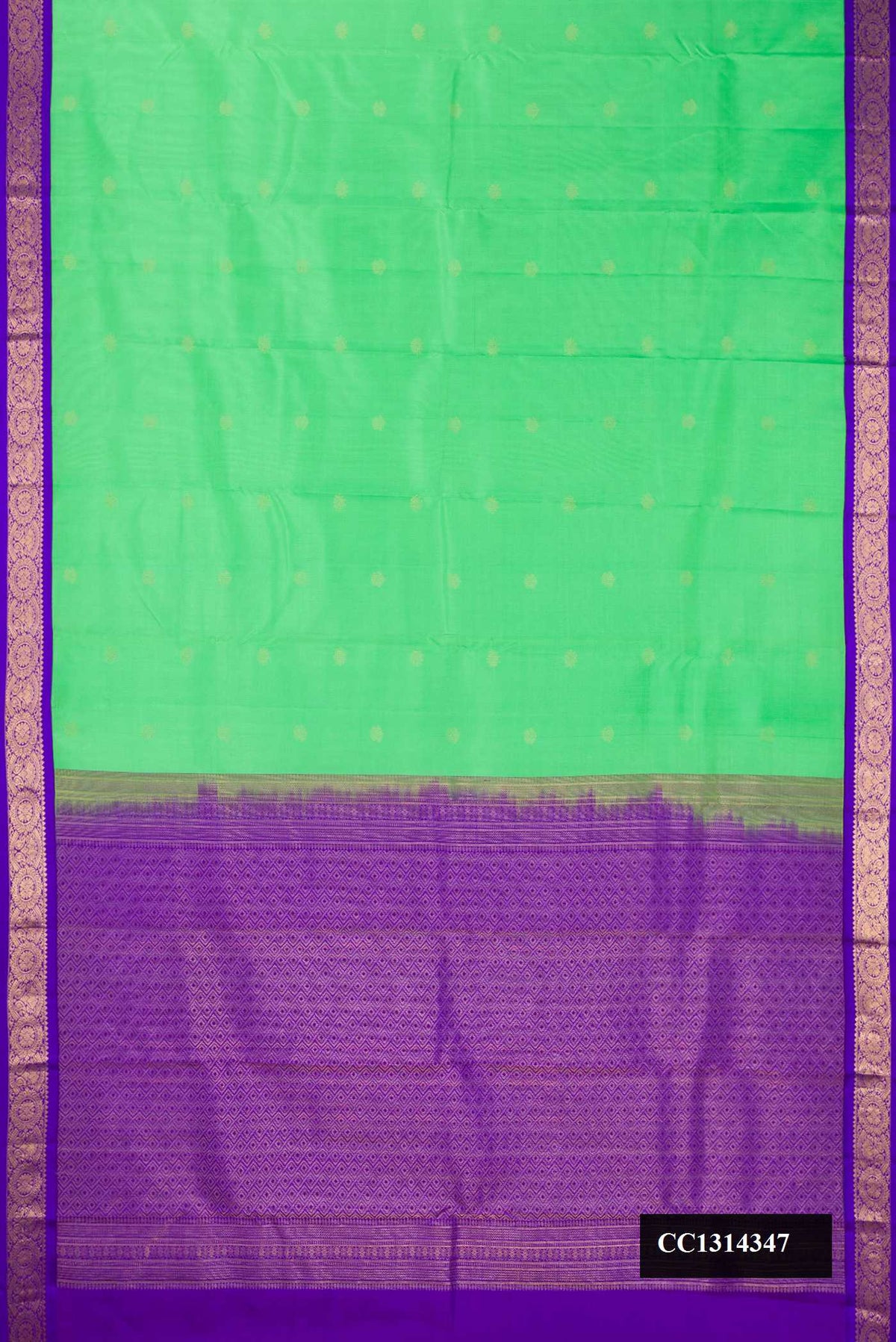 Parrot Green Dual Tone Kanchipuram Silk Saree with Zari Butta on the body and Zari Border.  displayed on a mannequin